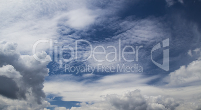 cirrus and cumulus clouds on blue sky