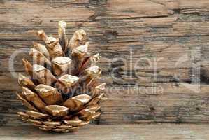 Christmas Background with Golden Fir Cone