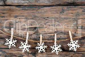 Wooden Snowflakes on Line