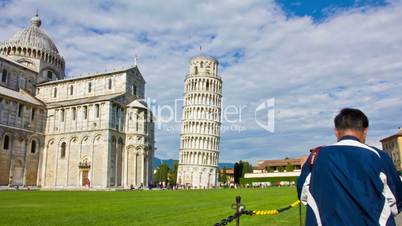 Tourists on Square of Miracles visiting Leaning Tower. Time Lapse on June 03 in Pisa, Italy