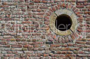 Brick wall and round hole
