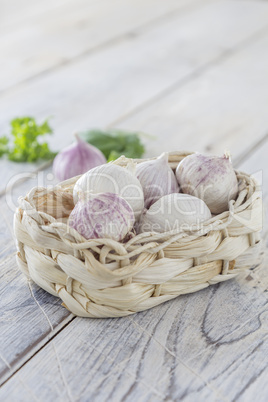 garlic cloves in a basket