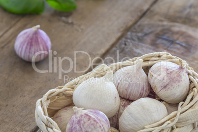 garlic cloves in a basket