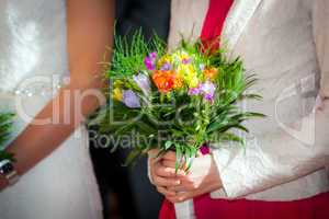 Woman holding a wedding bouquet