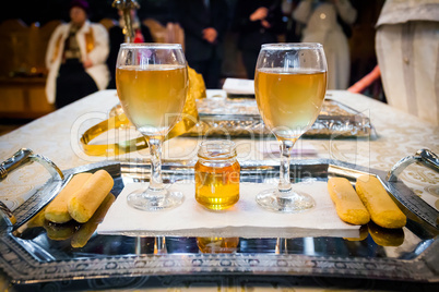 Wedding wine glasses and honey