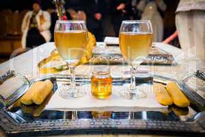 Wedding wine glasses and honey