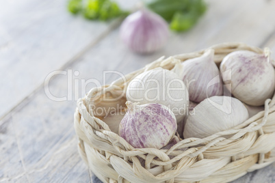 garlic cloves in a basket