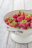 Strawberries in a sieve