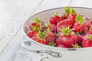 Strawberries in a sieve