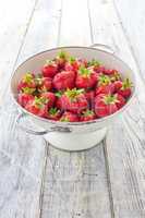 Strawberries in a sieve