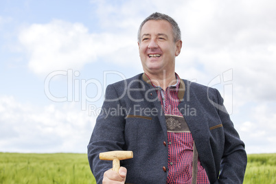 Farmer standing in his field