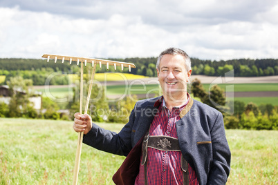 Farmer standing in his field