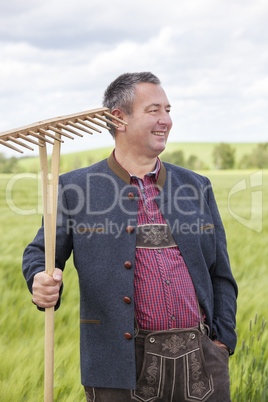 Farmer standing in his field