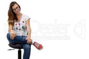 Teenager girl with glasses sitting