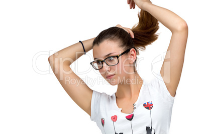 Teenager girl with glasses and ponytail