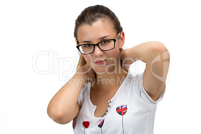 Teenager girl with glasses looking at camera