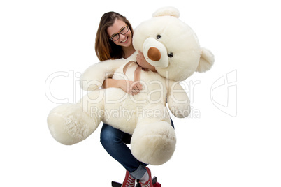 Young teenager with teddy bear