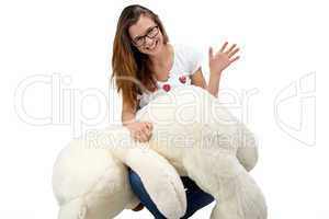 Funny young teenager with teddy bear