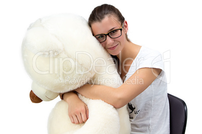 Young teenager with teddy bear weared glasses