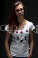 Serious teenager girl with glasses