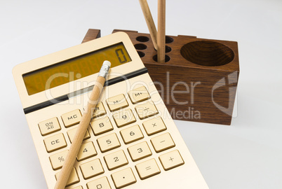digital calculator and pencil