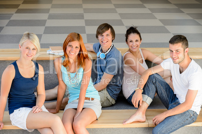 Group of college students sitting looking camera