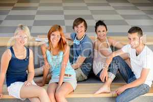 Group of college students sitting looking camera