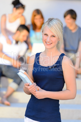 Summer college student girl smiling with friends