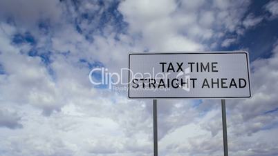Tax Time Ahead Sign Clouds Timelapse