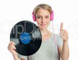 Mädchen mit Schallplatte und Kopfhörer