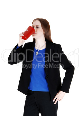 Woman drinking coffee.