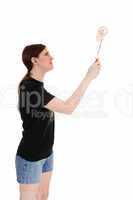 Woman painting wall.