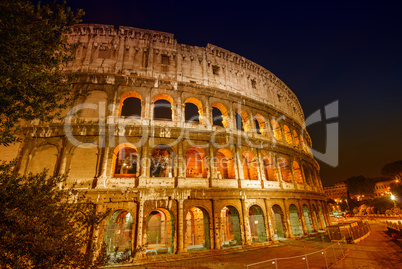 Stunning view of Colosseum at night, Rome - Italy