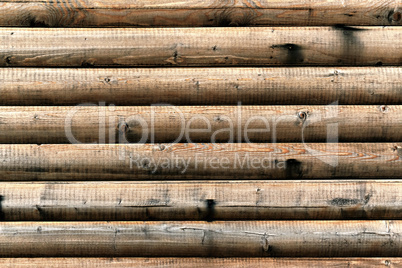 grungy background of cylindrical logs