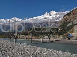 Damaged bridge and Dhaulagiri