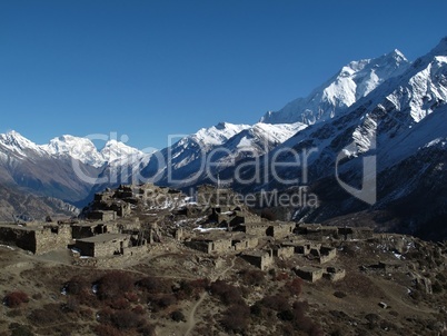 Ruined village and Annapurna Two