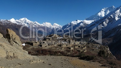 Old village near Manang and high mountains