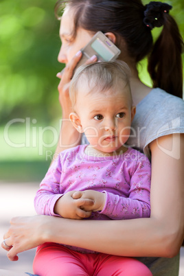 Baby girl in mothers arms