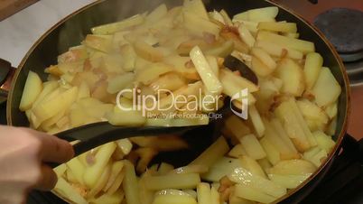 Frying Pan with Sliced Potatoes, closeup