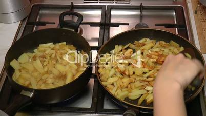 Two Frying Pan with French Fries, closeup