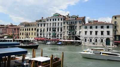 The passenger ship with tourists and motor boats are on Grand Canal, Venice, Italy