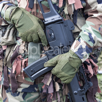 Soldier holding weapon