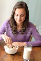 Dieting teenage girl eat cereal healthy breakfast