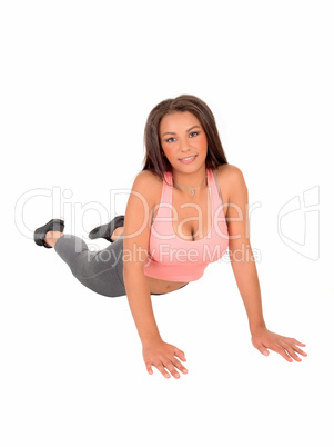 Woman doing pushups.