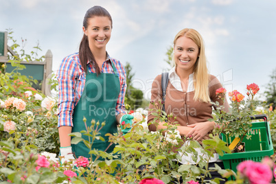 Shop assistant and customer in garden center