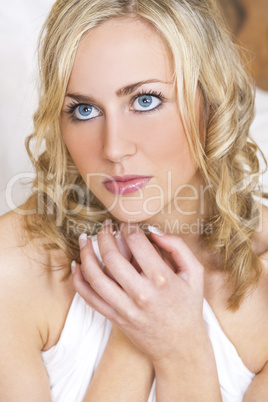 Beautiful Blond Woman Girl with Blue Eyes