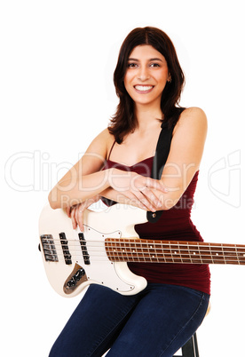 Sitting woman with guitar.