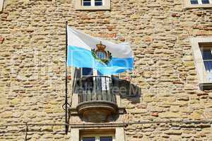 The flag of San Marino on a building