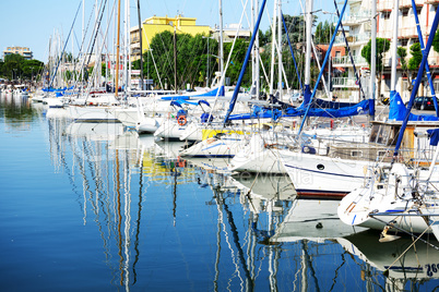 The water channel with parked sail yachts, Rimini, Italy