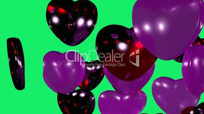 Balloons in the shape of heart rise up. seamless,green background